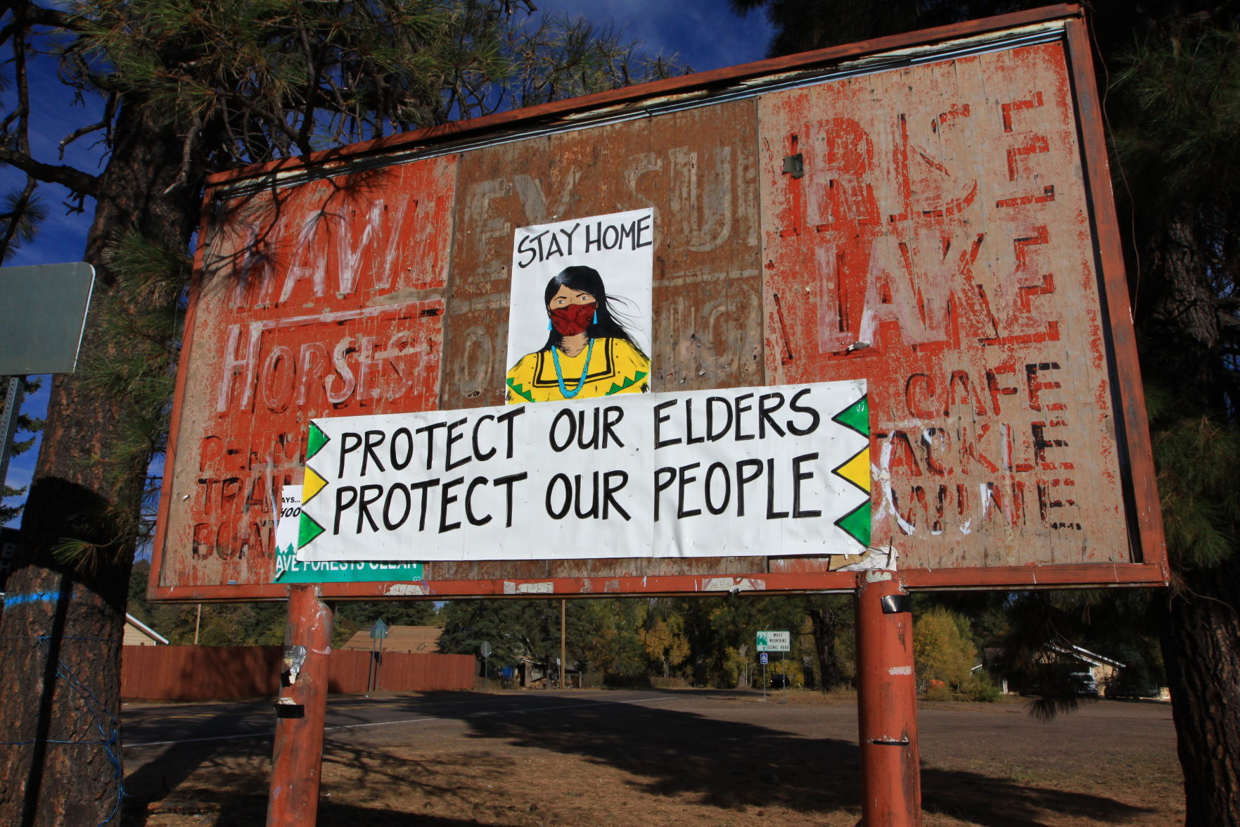 WMAT sign.JPG - Protect our elders Protect our people sign